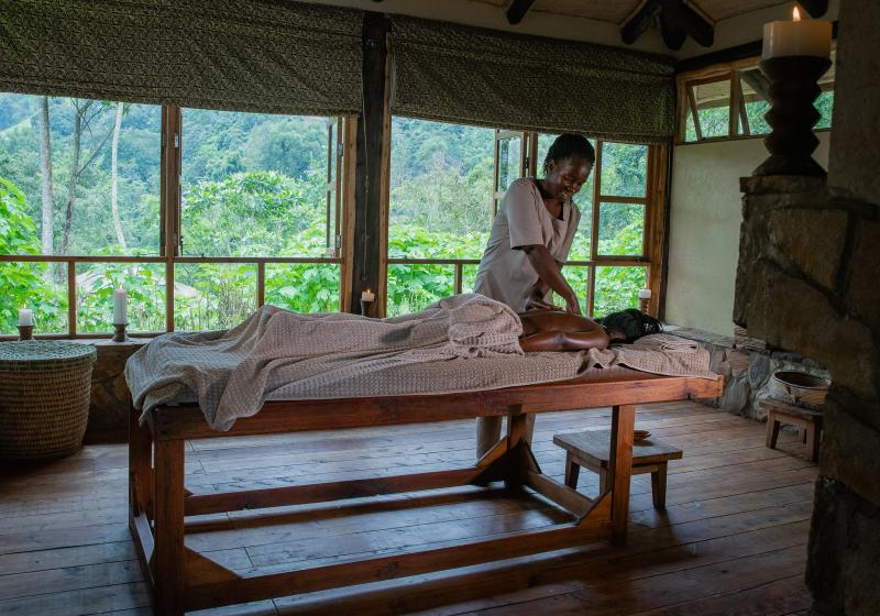 a woman getting a massage in luxury safari lodge