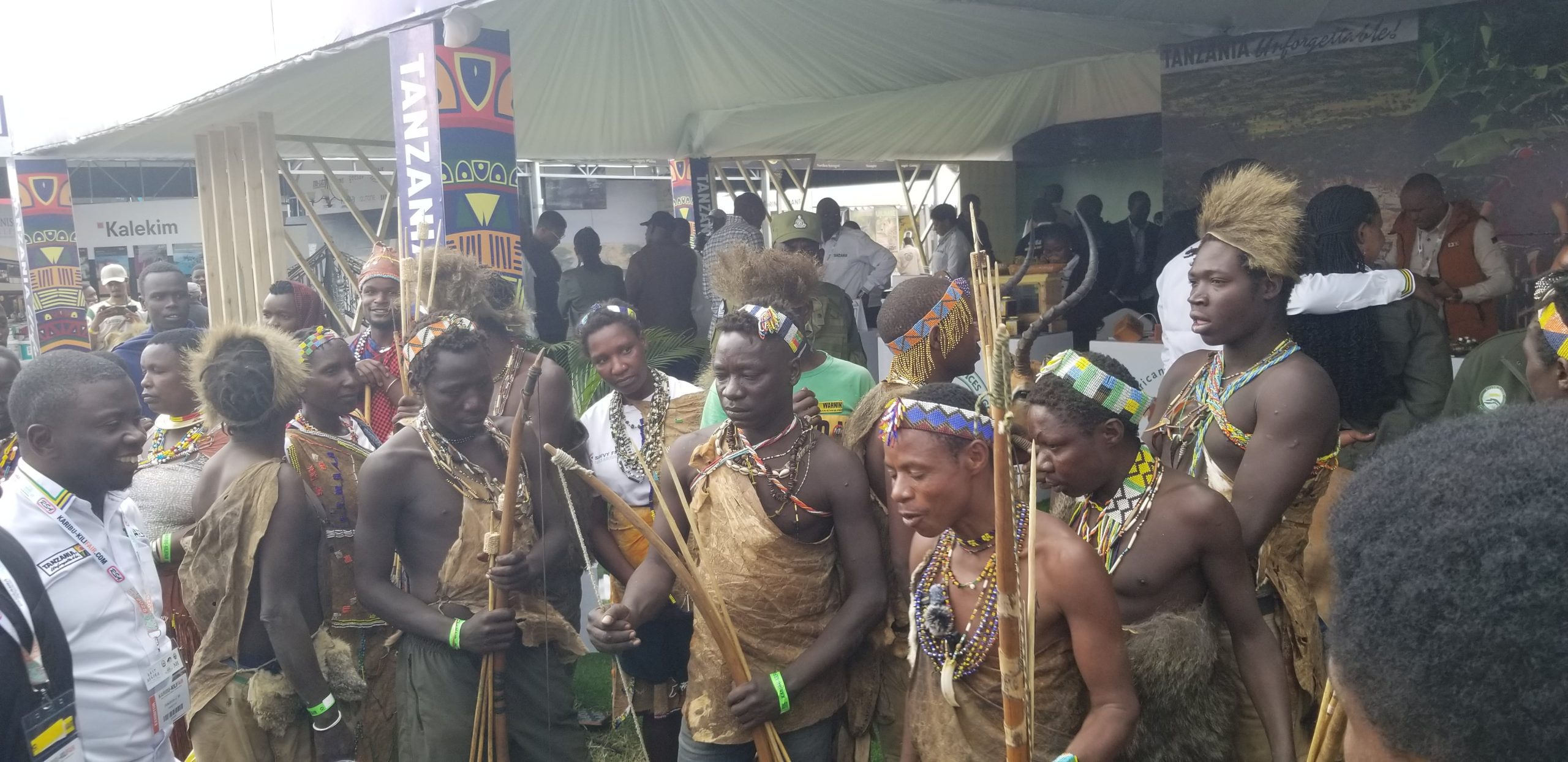 a group of Hadzabe people holding arrows